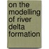 On the modelling of river delta formation