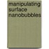 Manipulating surface nanobubbles