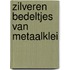 Zilveren bedeltjes van metaalklei