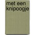 Met een knipoogje