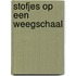 Stofjes op een weegschaal