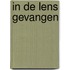 In de lens gevangen