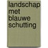 Landschap met blauwe schutting