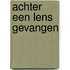 Achter een lens gevangen